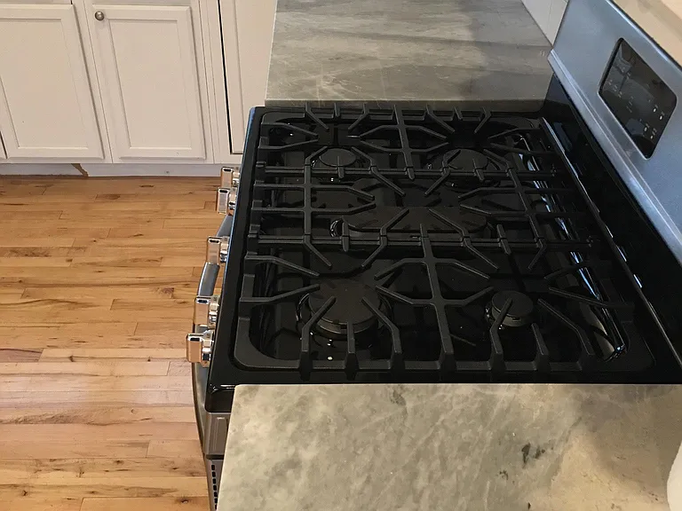 Gas range and marble countertops