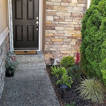 Entry way with landscaping
