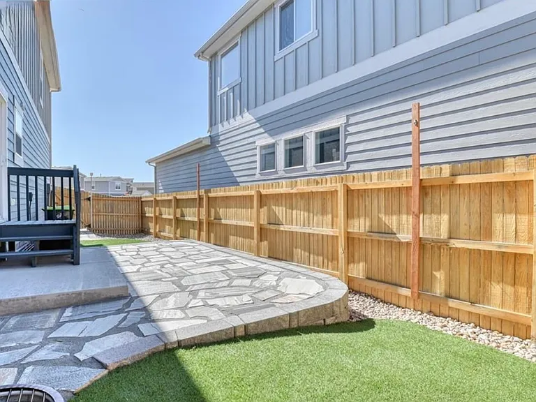 Side Yard - patio and turf.
