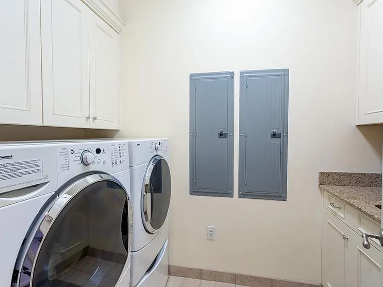 Large Utility Room with sink.