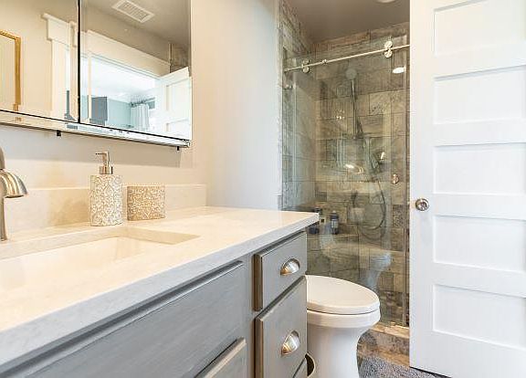 Completely renovated Master bath. Includes lighted, medicine cabinet mirrors and high-end features.