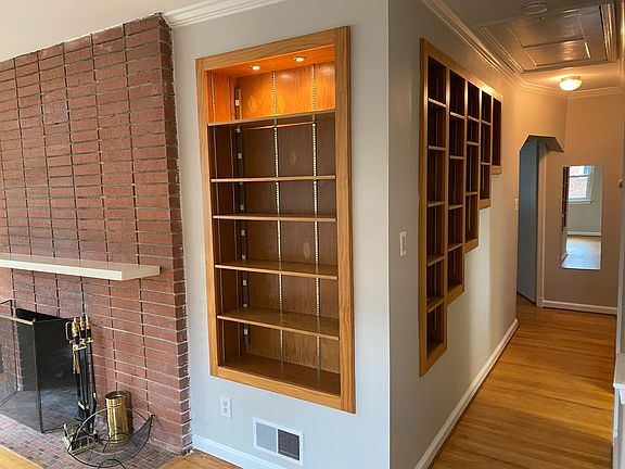Built in shelving in Living room and hallway