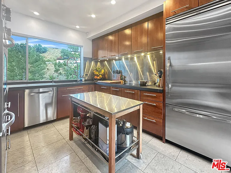 8265 Mannix Dr — Photo 15