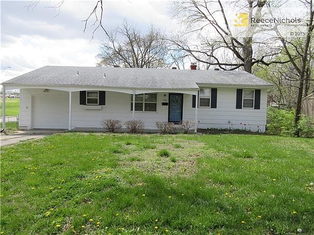 House sits on large corner lot near elementary school