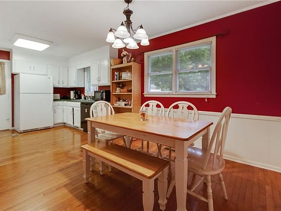 Sunny breakfast area open to kitchen.