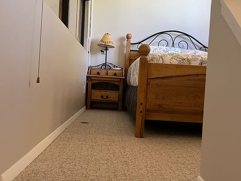 stair entry (open stairs) to loft queen bed
