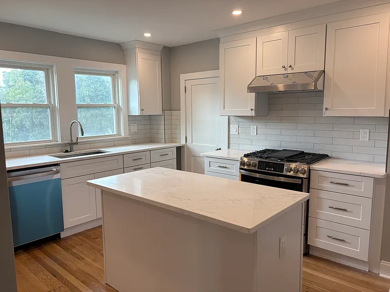 Kitchen - New hardwood floors, new cabinets, new countertops, new appliances, new windows, new doors, new insulation, new sheetrock, new electrical and Plumbing.
