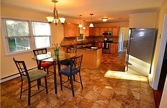 Beautiful Tile Floor in Kitchen and Dining Room