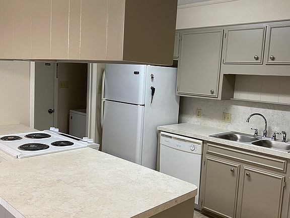 Newly remodeled kitchen. New Designer Formica on countertops; Top of the Line newly installed stove; professionally painted kitchen cabinets. All new LED lighting throughout unit.
