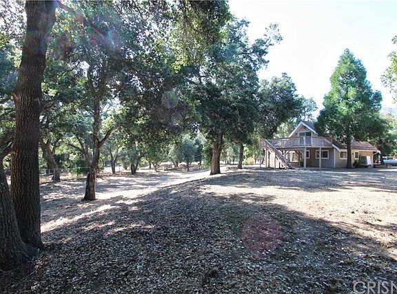 Back of home with so much land.