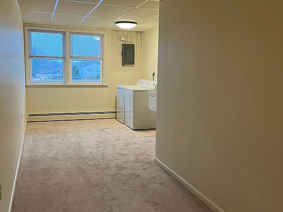 family room with laundry area