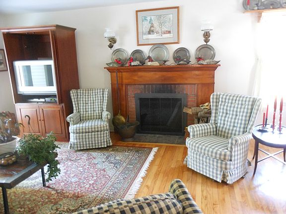 Living Room with Hardwood Floors and Fireplace