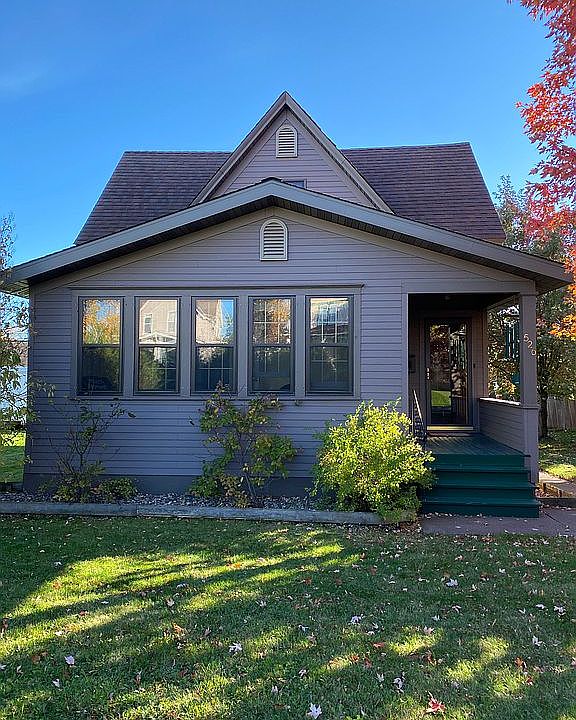 New storm windows in porch 