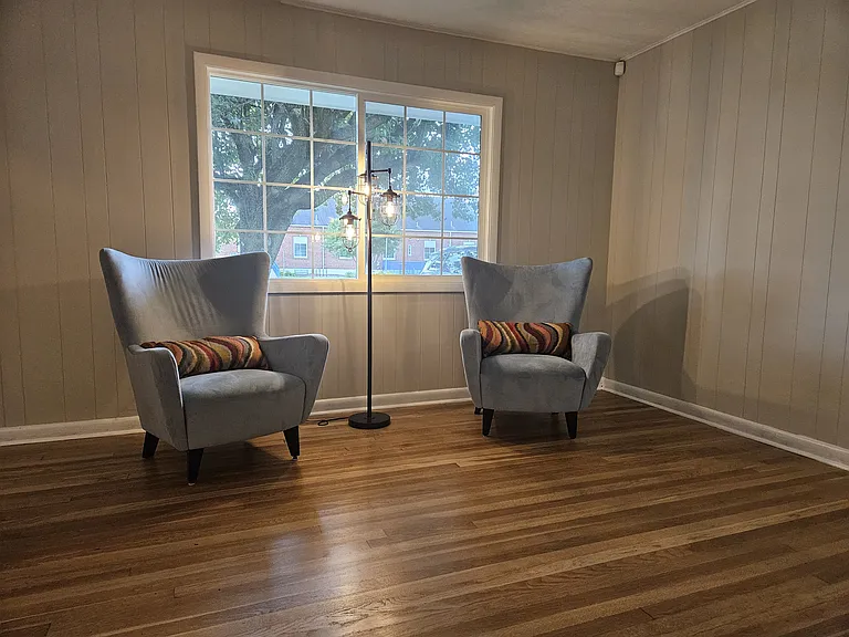 X-large window for lots of lighting, newly refinished original hardwood flooring