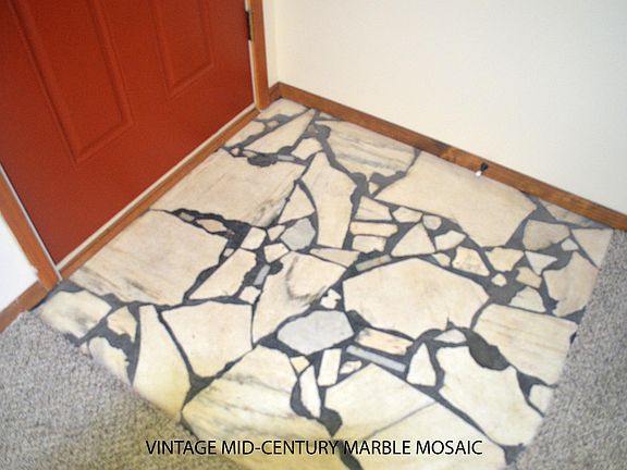 Entry detail: vintage marble mosaic floor