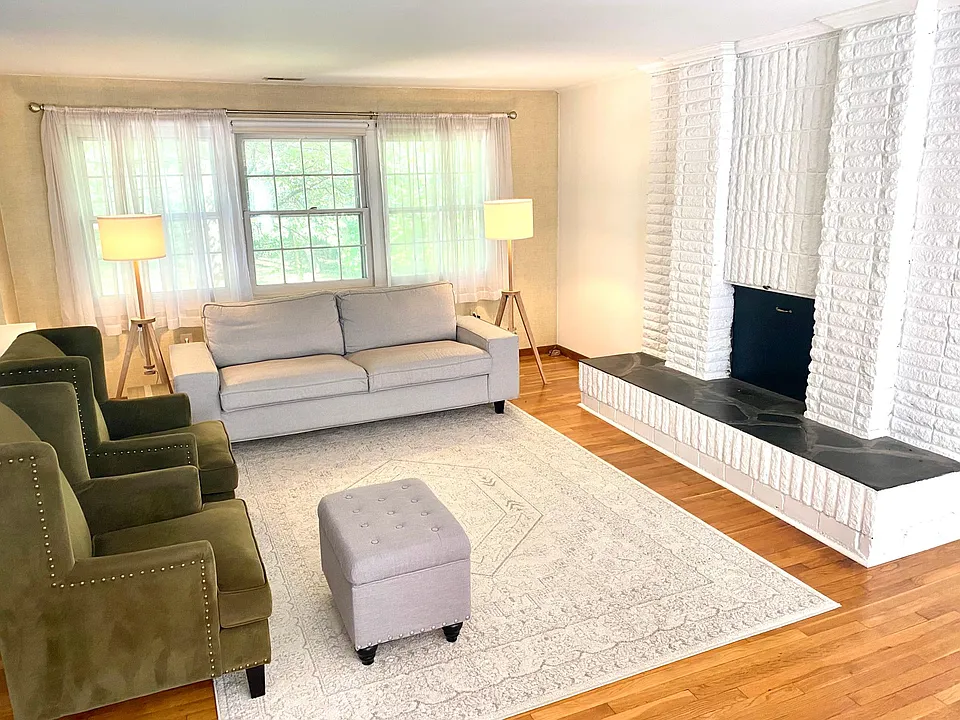 Upper level living space open to kitchen and dining.