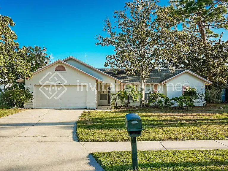 7115 Queen Palm Cir — Photo 1