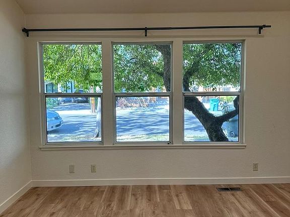 Living room windows facing Emerson St