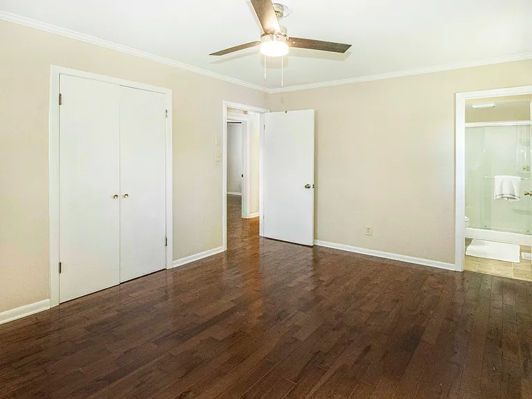 Primary owners suite comes complete with a brand new bath including walk in shower!!
Notice the gleaming hardwoods make this generous space each to maintain.....