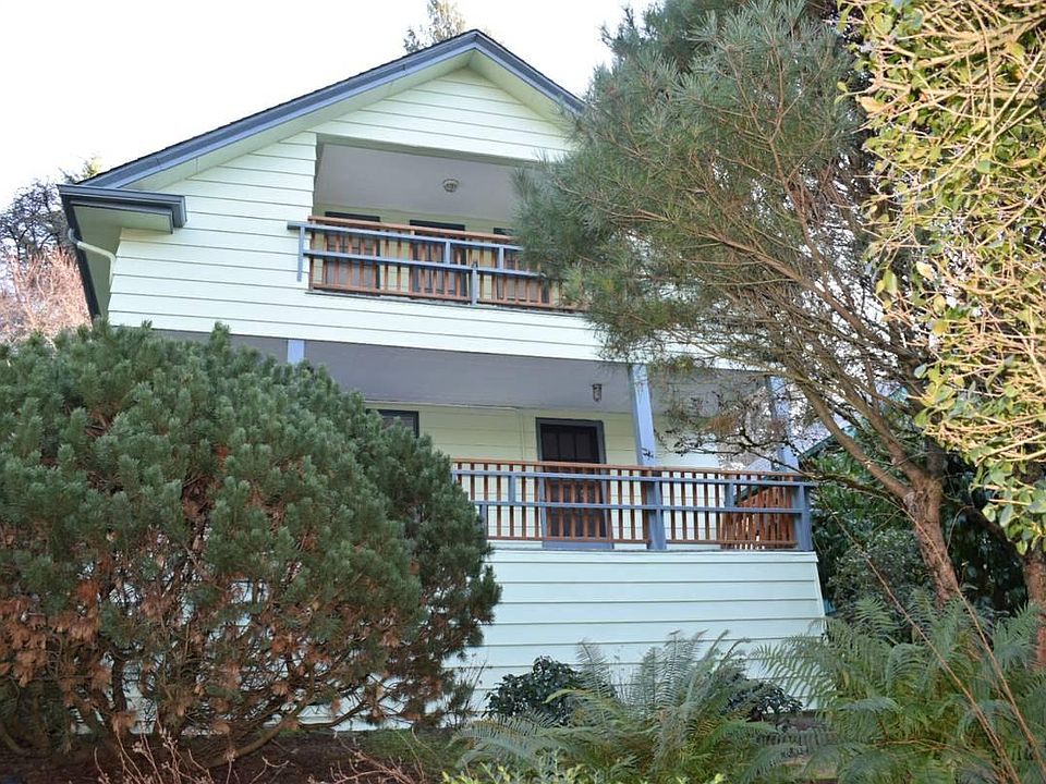 Spacious light filled updated 1920s era house with two porch