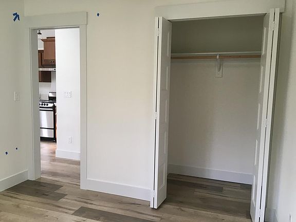Bedroom closet with closet door open