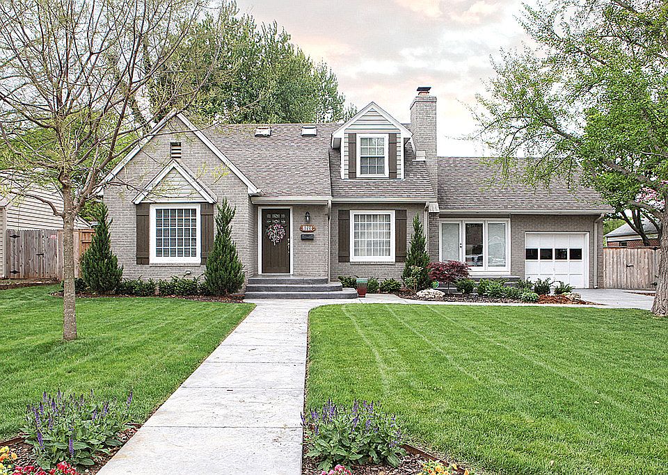 A facelift of the lawn, driveway and landscaping has just been completed on this 1941 vintage Cottage.