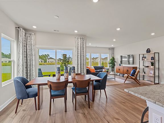 Large windows allow light to flood into your living space Clear Pond in Myrtle Beach, SC .