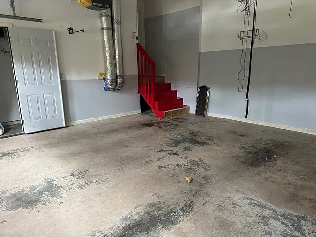 Stairs to laundry room then kitchen and door to bonus room.