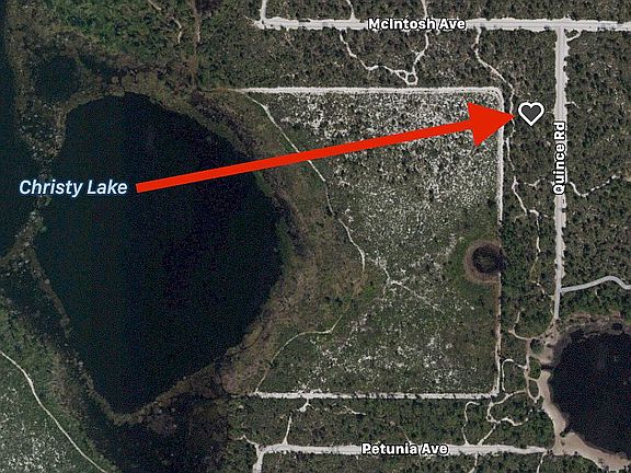 23ac Edilia Lake in Backyard