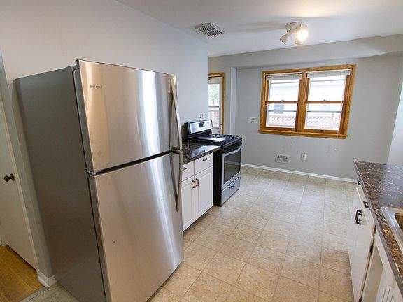 New Whirlpool refrigerator and gas range.