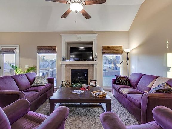 Vaulted Ceilings add to the Openness of the Living Room