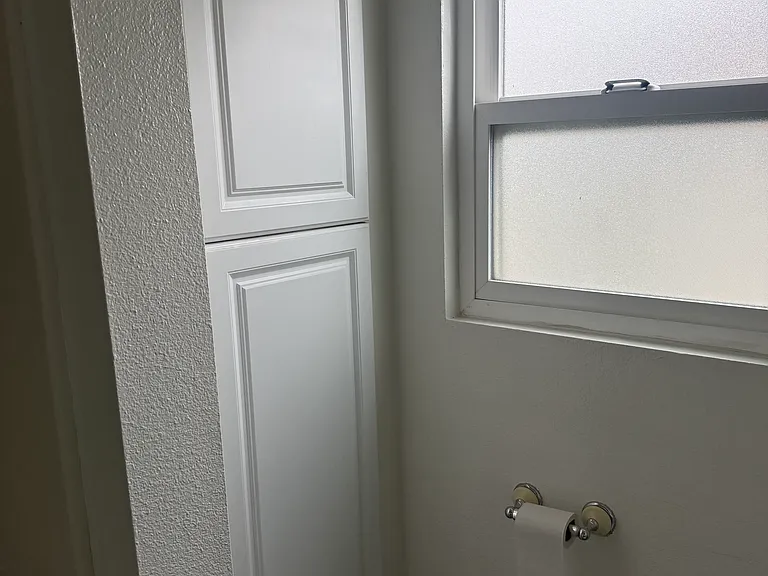 Linen cupboard in bathroom #1