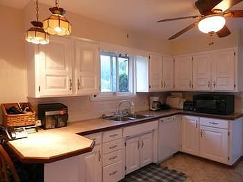 A nice bright kitchen with white cabinets