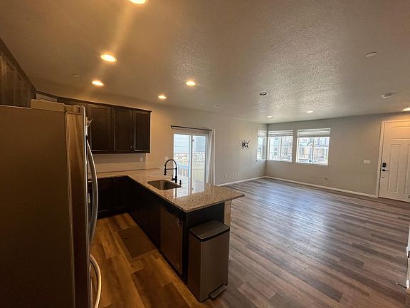 View from Garage Entrance of Kitchen, Living Room and Dining Room