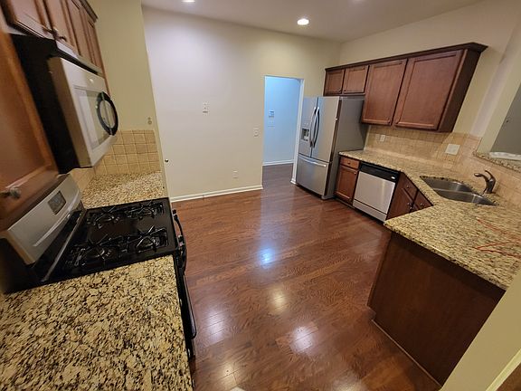 Kitchen facing entryway (garage)