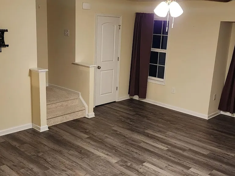 living room, 1/2 bath, stairs