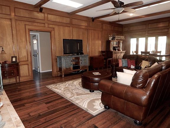 Handsome Beamed Ceiling Compliment The Hand Scraped, Hickory Hardwood Floors.