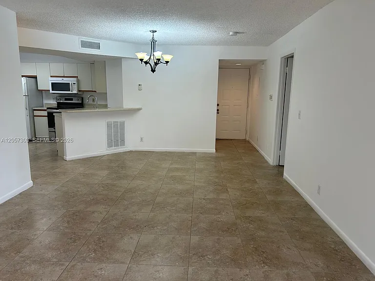 8851 Wiles Rd #208 — Photo 14