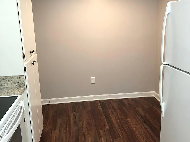 Eat in kitchen area with large pantry for storage