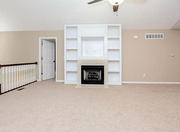 Built in shelving also has hook up for TV/Cable or Satellite dish