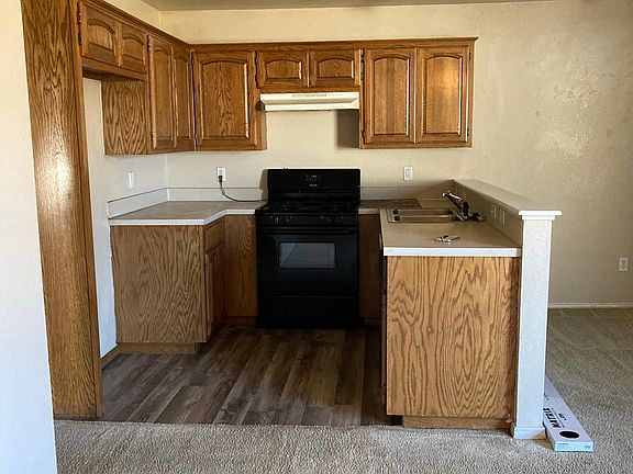 Kitchen with stove and dishwasher