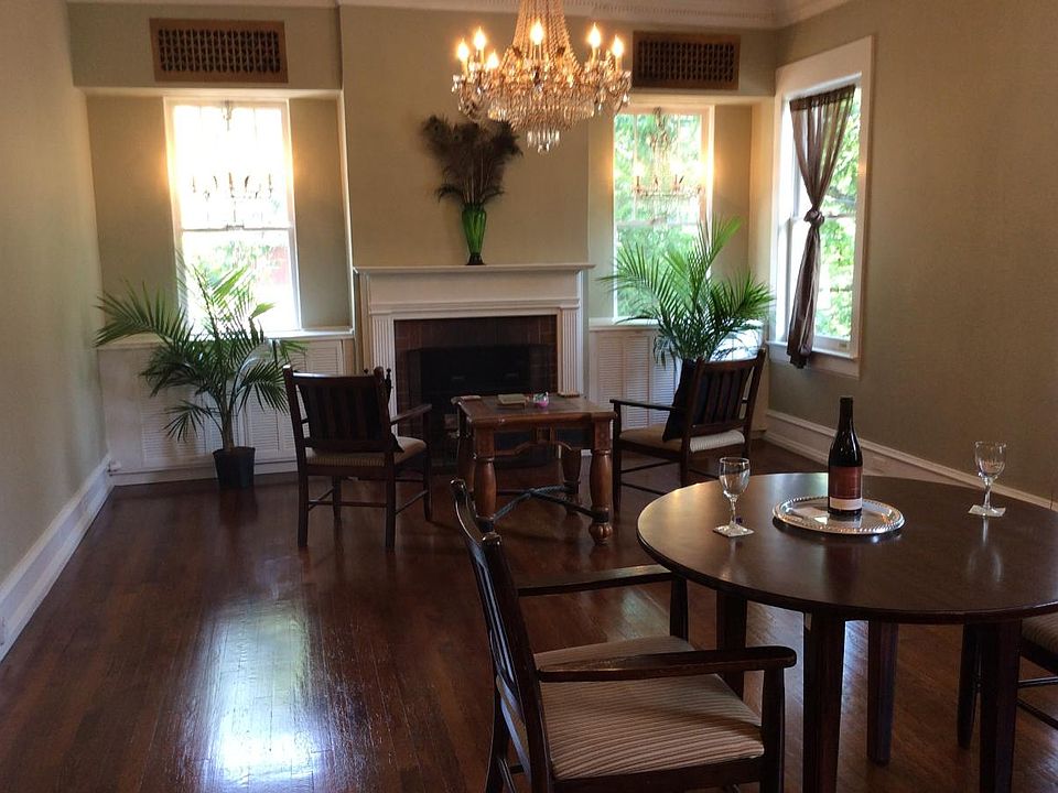 Living room15 x 29 has2(3.5)crystal chandeliers,4sconces,fp, Crown and dental molding