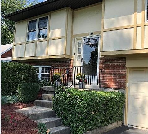 Stairs leading to front door; can also enter through garage. This home features a 2 car garage - ideal for winter weather days