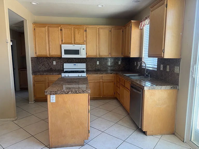 Kitchen with a lot of cabinets