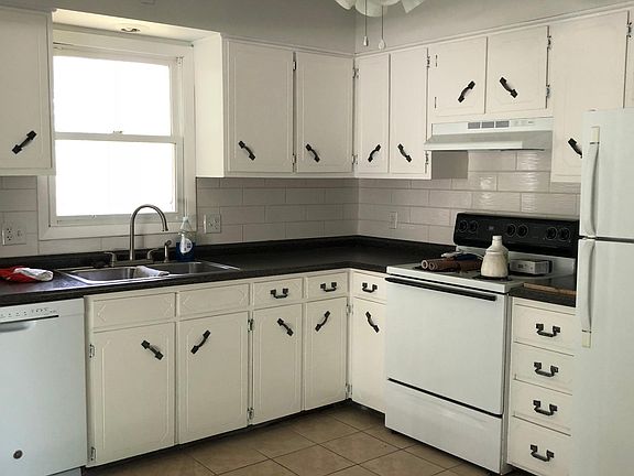 Cabinets restored new sink, faucet, backsplash, countertop, 