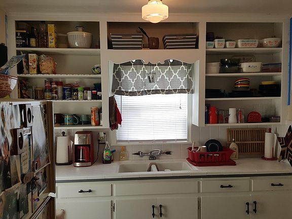 Kitchen/ We can put cabinet doors back on upper cabinets