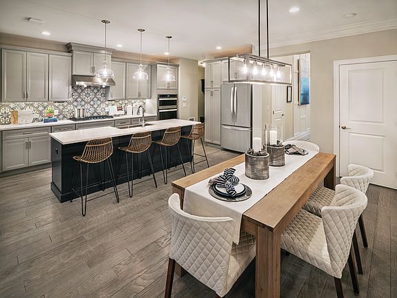 Kitchen with Center Island Open to Large Dining Area