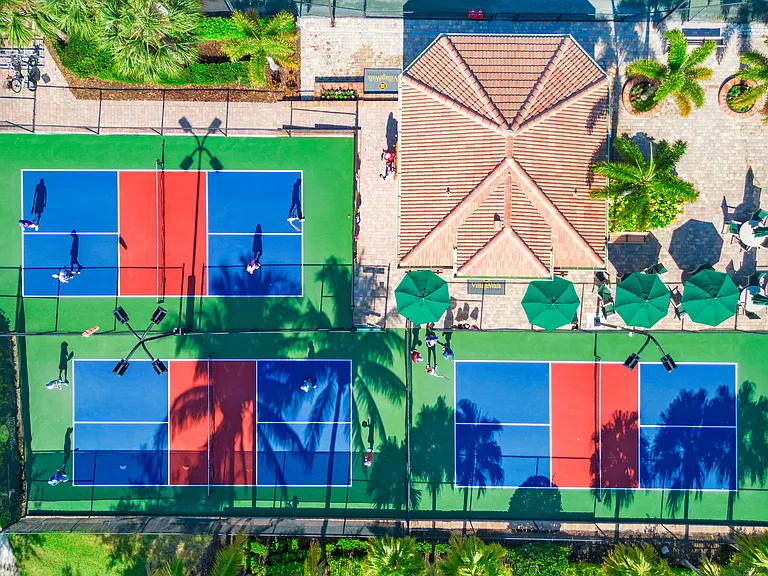 Village Walk Tennis Pavillion and three of many tennis courts