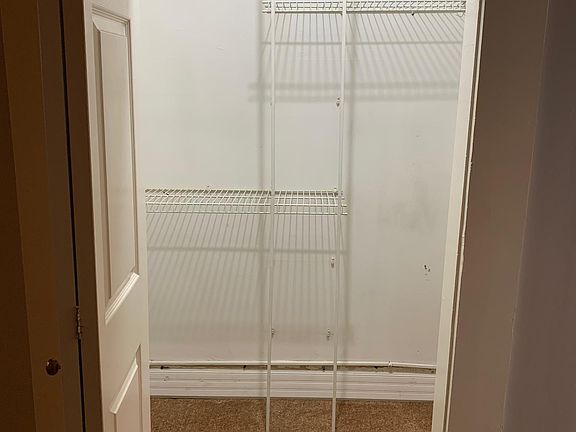 Walk-in closet in the bedroom area.