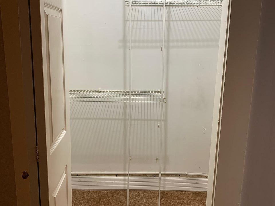 Walk-in closet in the bedroom area.